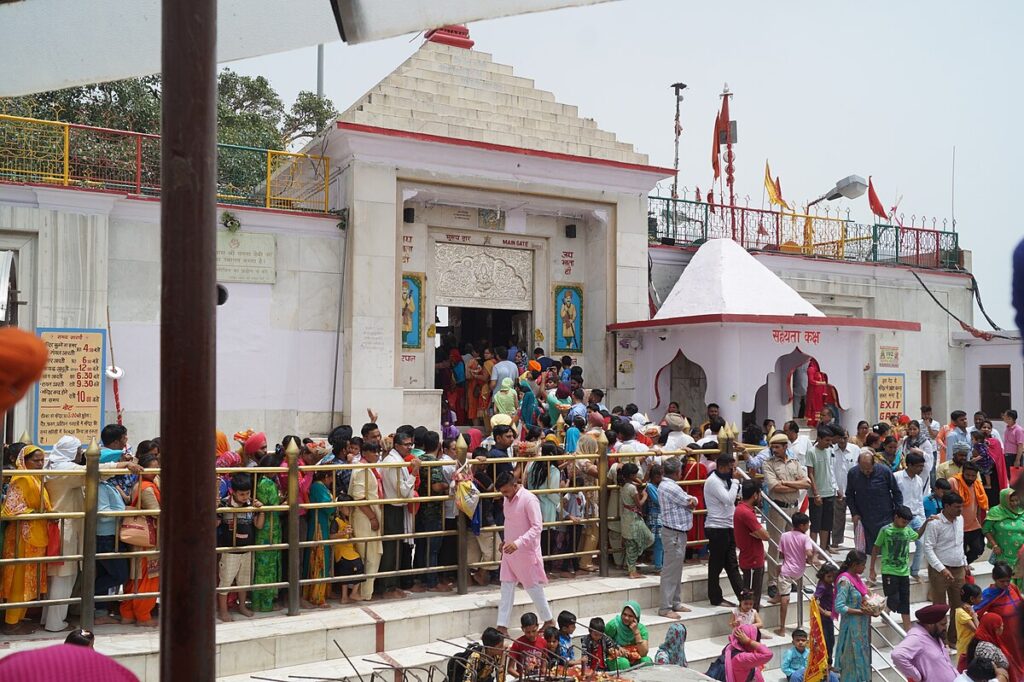 Naina Devi Temple in Himachal Pradesh with pilgrims entering the mandir.